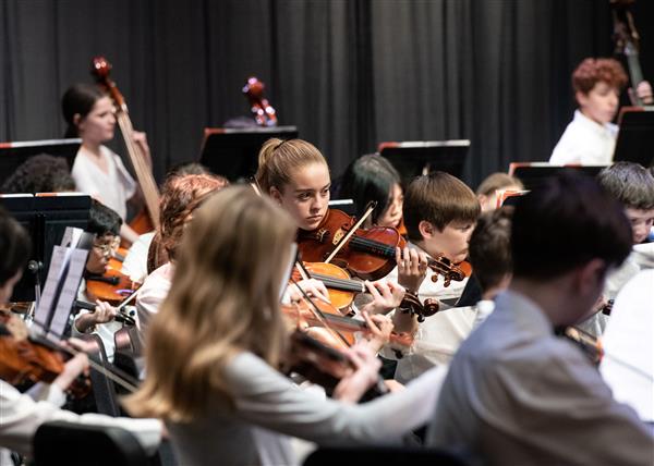 Students performing at the 2023-2024 All County Orchestra Concert
